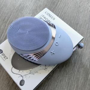 NEW electronic facial scrubbing brush